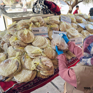 Bread distribution in Gaza by The Real Guys and Al-Qulub Trust with hundreds of loaves prepared for families
