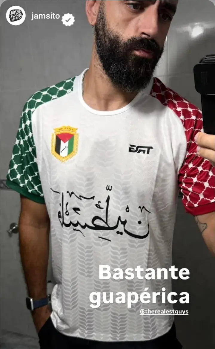 Man wearing Palestine football jersey white short sleeve shared by Spanish 
